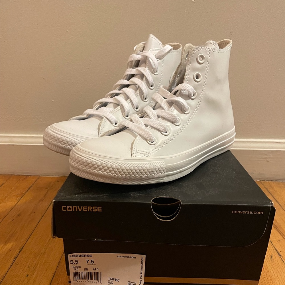 Brand new Converse in white rubber.